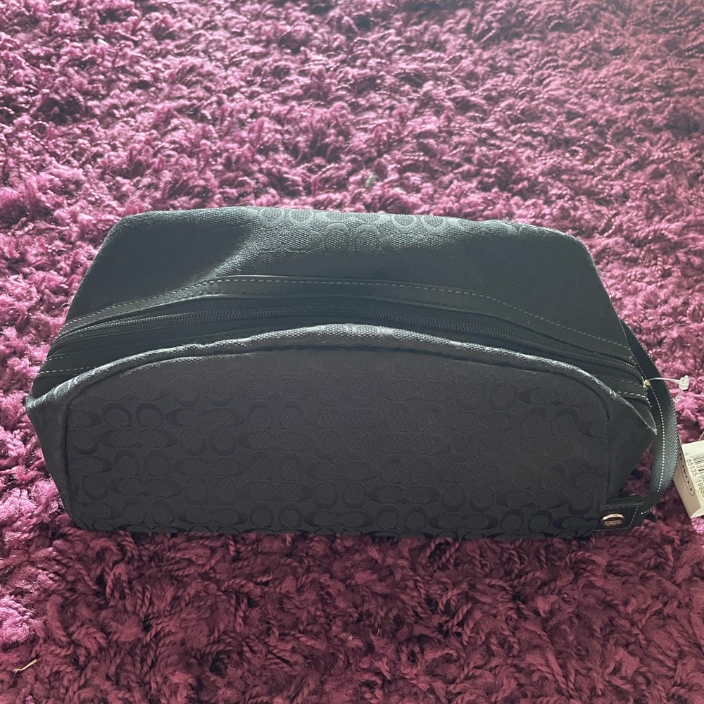 NWT black Coach signature toiletry bag unisex